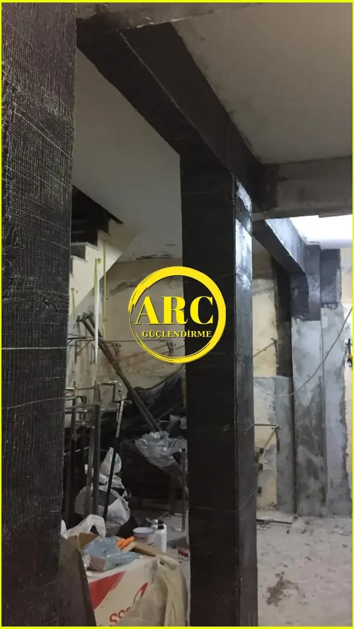 Carbon fiber plate strengthening on a damaged concrete beam for flexural capacity