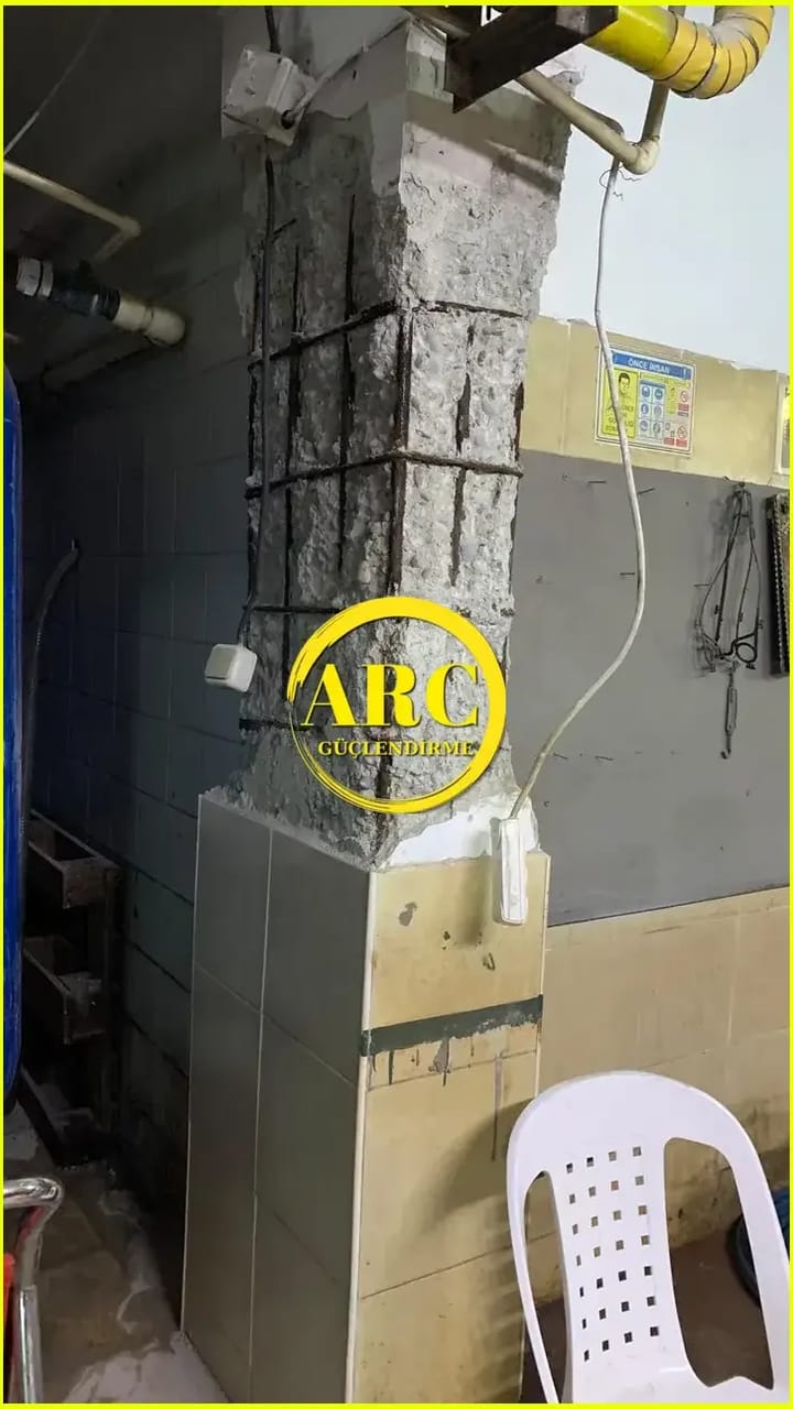 Floor slab strengthening using carbon fiber laminates in a commercial building